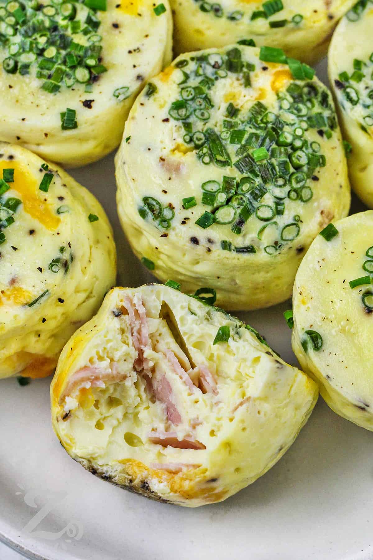 Instant Pot Egg Bites on a plate with a bite taken out of one