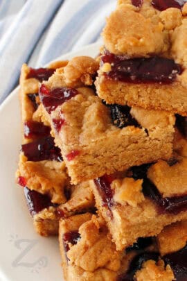 a stack of peanut butter and jelly bars