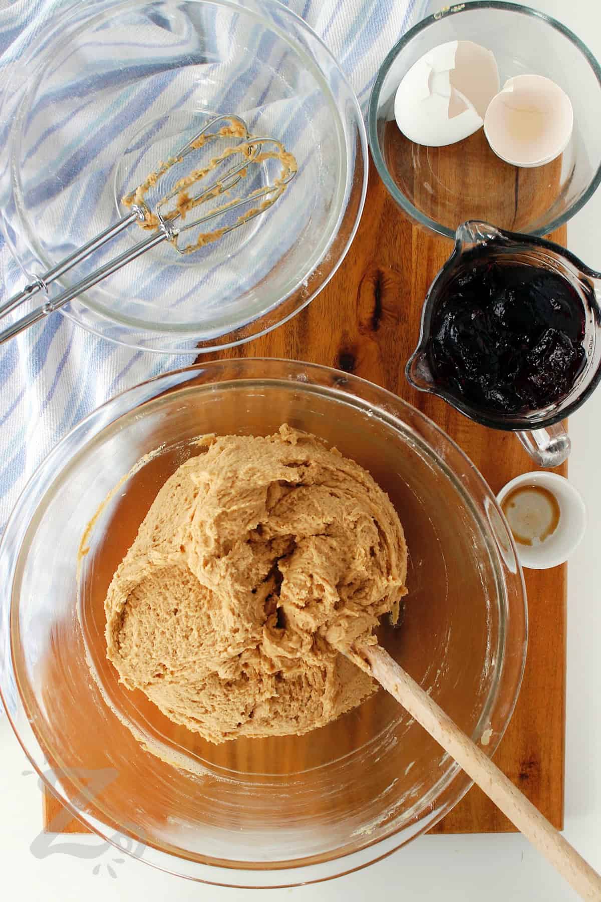 flour added to the creamed mixture to make peanut butter and jelly bars