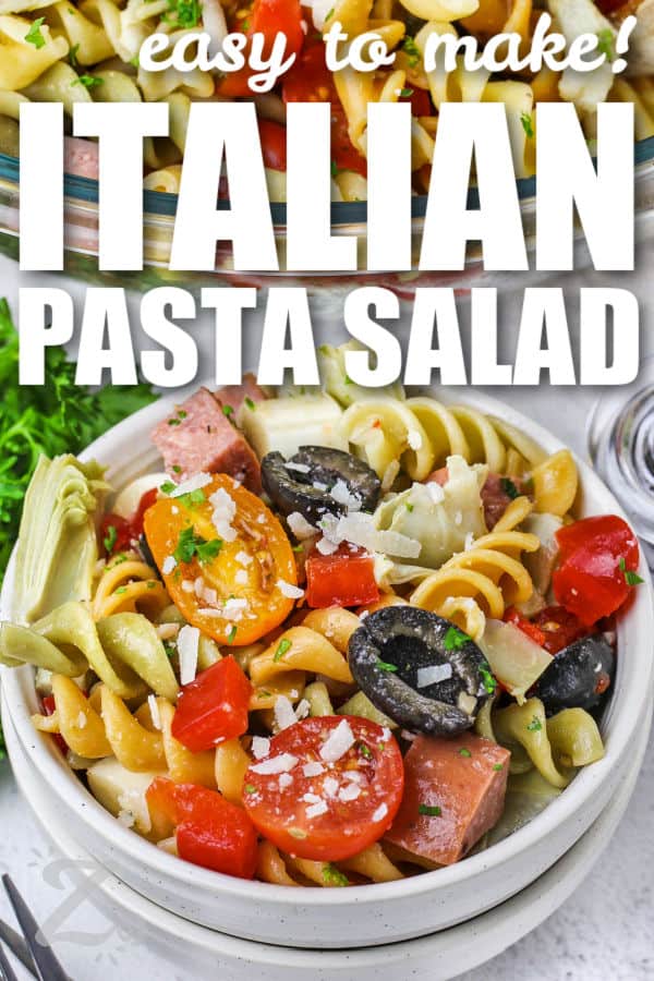 Italian Pasta Salad with cheese in a bowl and a title