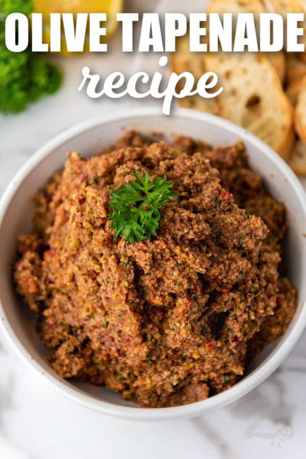 olive tapenade in a bowl with writing