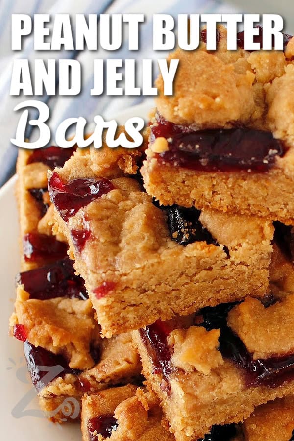 a stack of peanut butter and jelly bars with a title