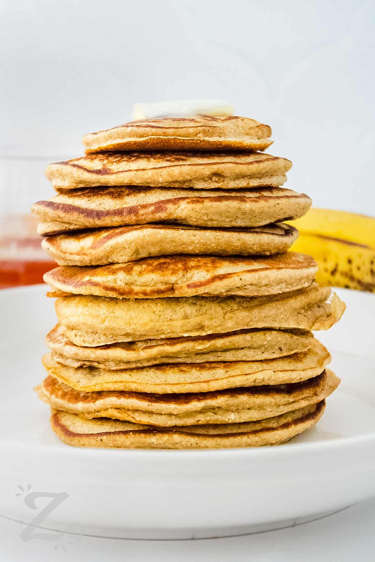 stack of Banana Oat Pancakes on a plate