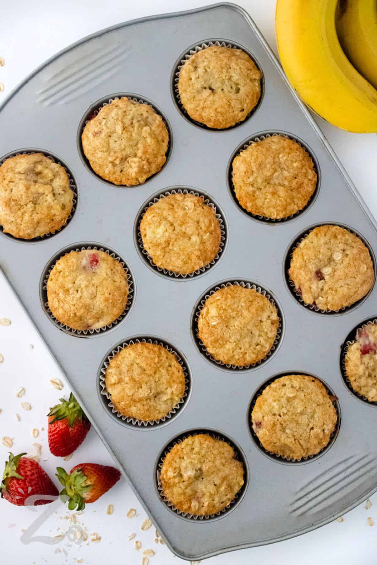 baked Strawberry Banana Muffins in the muffin tin