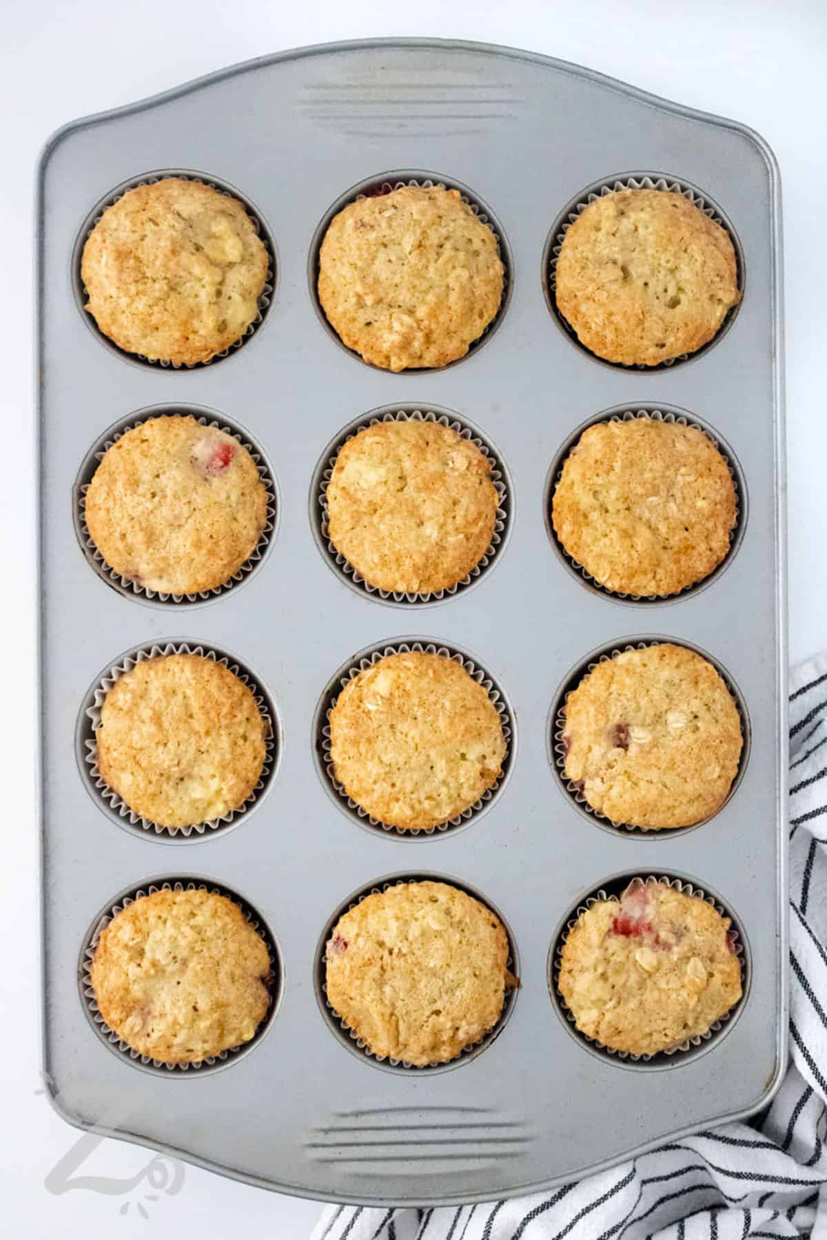 cooked Strawberry Banana Muffins in the muffin tin