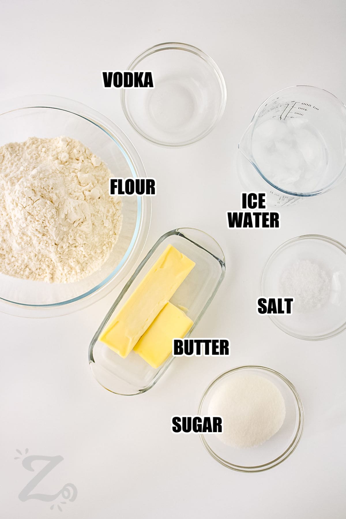 vodka , flour , ice water , salt , butter , and sugar with labels to make Easy Pie Crust