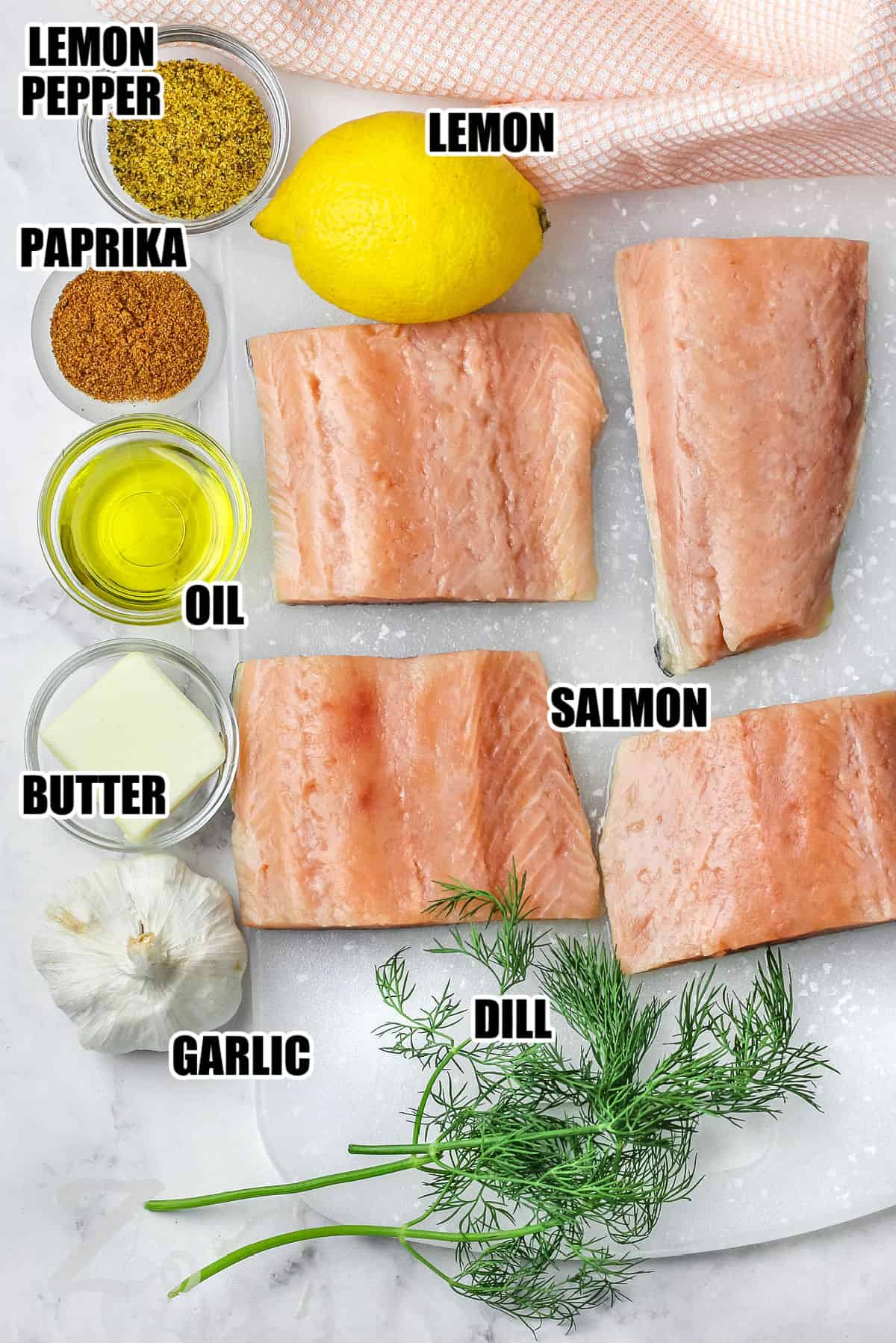 lemon , lemon pepper , paprika , oil , butter , garlic , dill , salmon with labels to make Pan Seared Salmon Filets