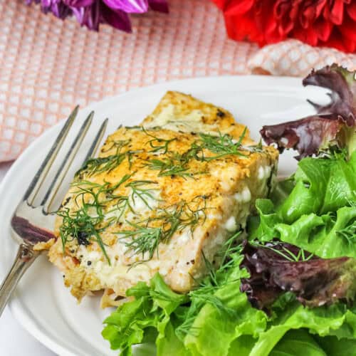 plated Pan Seared Salmon Filets with a salad