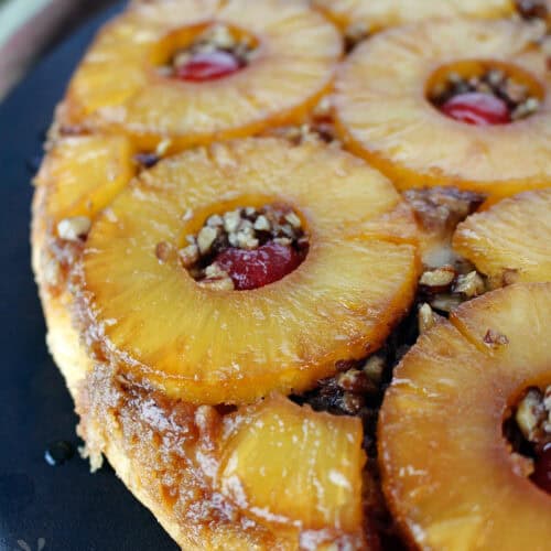 homemade pineapple upside down cake on on a platter