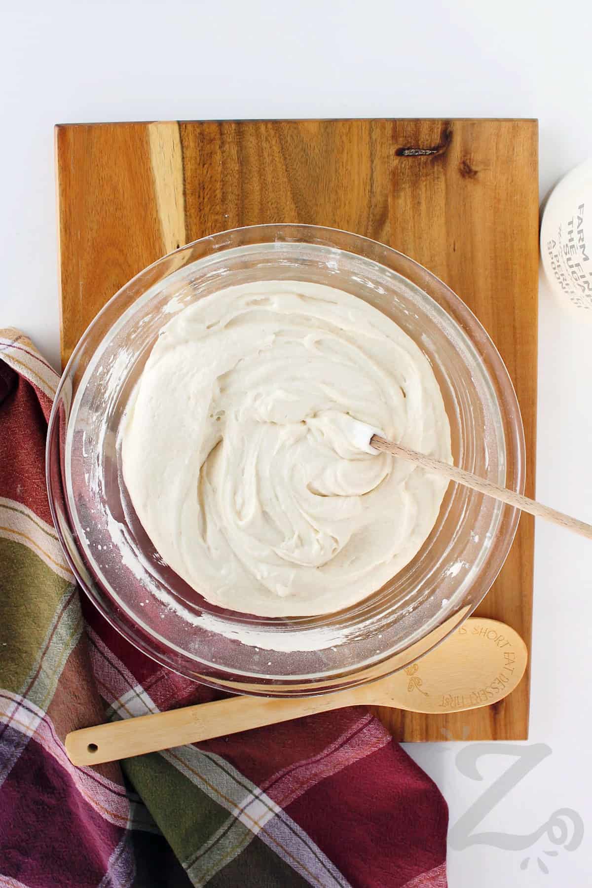 cake batter ready to pour on top of the pineapple layer in this homemade pineapple upside down cake recipe