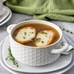 french onion soup in a heat safe soup crock