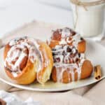 cinnamon roll on its side on a plate