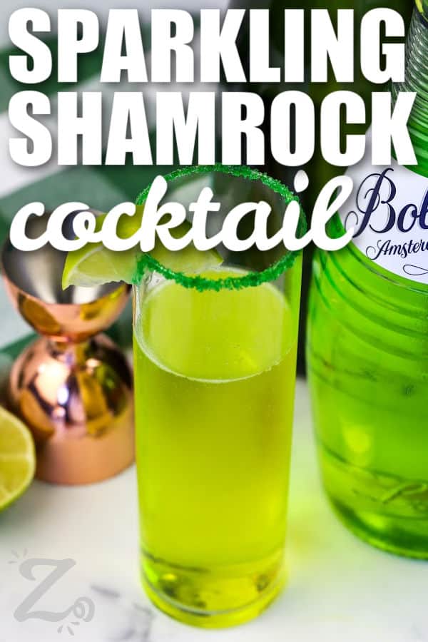 glass of Sparkling Shamrock Cocktail with a title