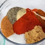 adding seasonings together to make Beef Brisket Rub