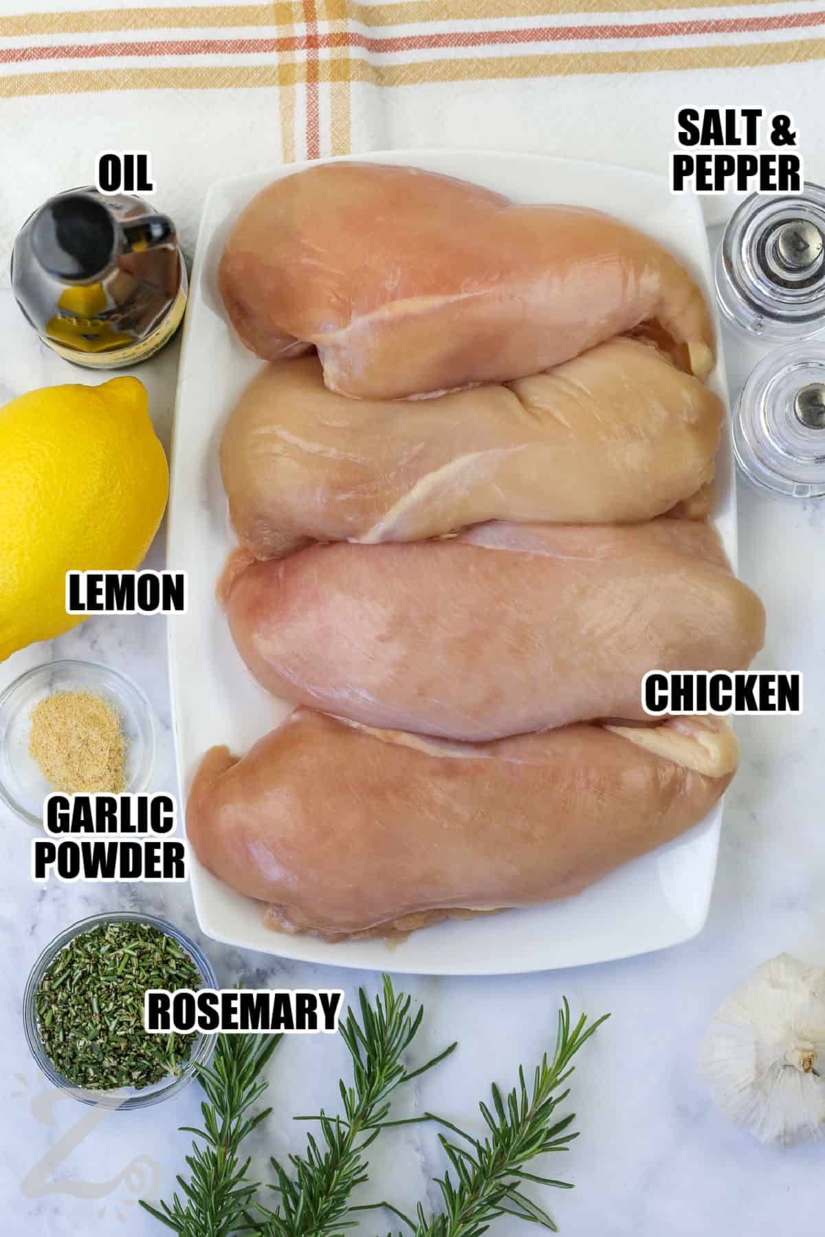oil , lemon , garlic powder , rosemary , chicken , salt and pepper with labels to make Grilled Chicken