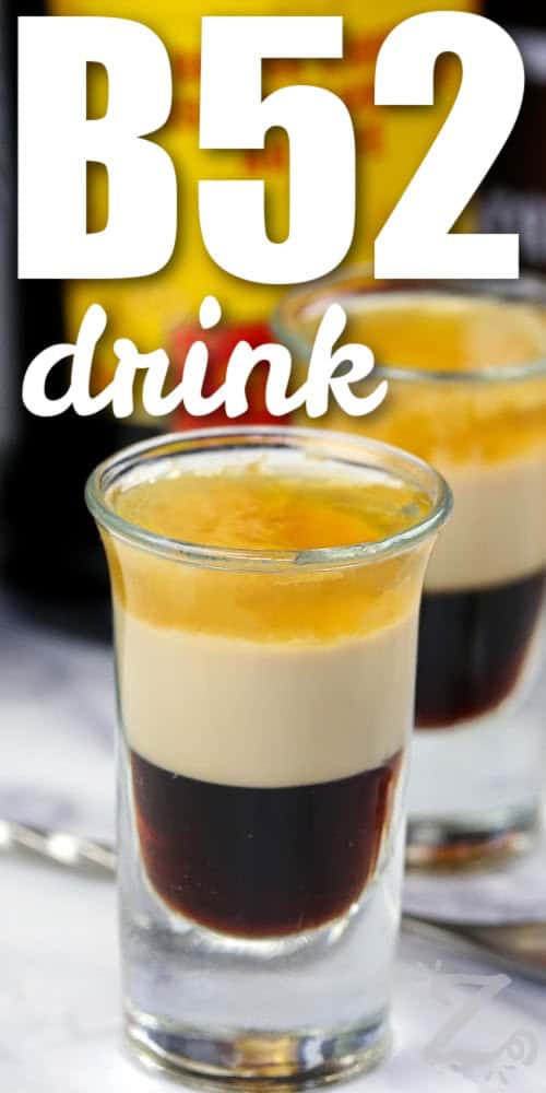 close up of B52 Drink in shot glasses with a title