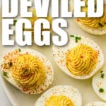 easy to make Classic Deviled Eggs on a plate with writing
