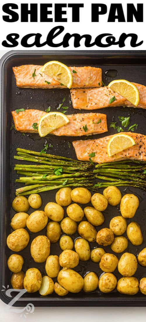 This sheet pan salmon recipe combines buttery salmon, tender potatoes, and crisp asparagus for a meal that looks as good as it tastes. Fresh lemon juice, garlic, and simple seasonings bring out the natural flavors of every ingredient. Everything roasts together for a delicious dinner with very little cleanup. Save this easy salmon dinner recipe for your next busy evening. #ourzestylife sheet pan with Sheet Pan Salmon with Asparagus and Roasted Potatoes with writing