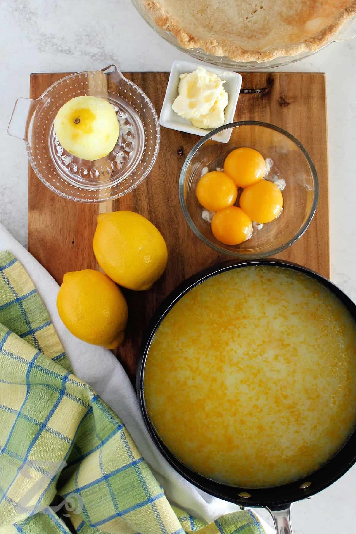 process to make this recipe for lemon meringue pie before butter or egg yolks have been added