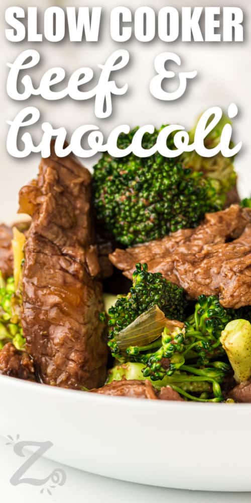 Slow cooker beef and broccoli makes dinner simple with a set it and forget it slow cooker recipe. It turns basic beef into a tender, flavorful dish coated in a savory Asian inspired sauce. Garlic and soy sauce create bold taste while broccoli adds fresh texture and color. This is a great option for easy weeknight meals or meal prep. Try it for a cozy homemade dinner and serve it with rice. #ourzestylife close up of Slow Cooker Beef and Broccoli with a title