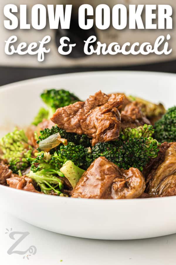 Slow cooker beef and broccoli is a family-friendly dinner that brings bold flavor with very little effort. The beef cooks slowly until it is tender and coated in a sweet and savory sauce. Broccoli is added near the end to keep it bright and fresh. This recipe works well for meal prep and leftovers for the next day. Make it for your next dinner and enjoy a simple, comforting meal. #ourzestylife Slow Cooker Beef and Broccoli in a bowl with a title