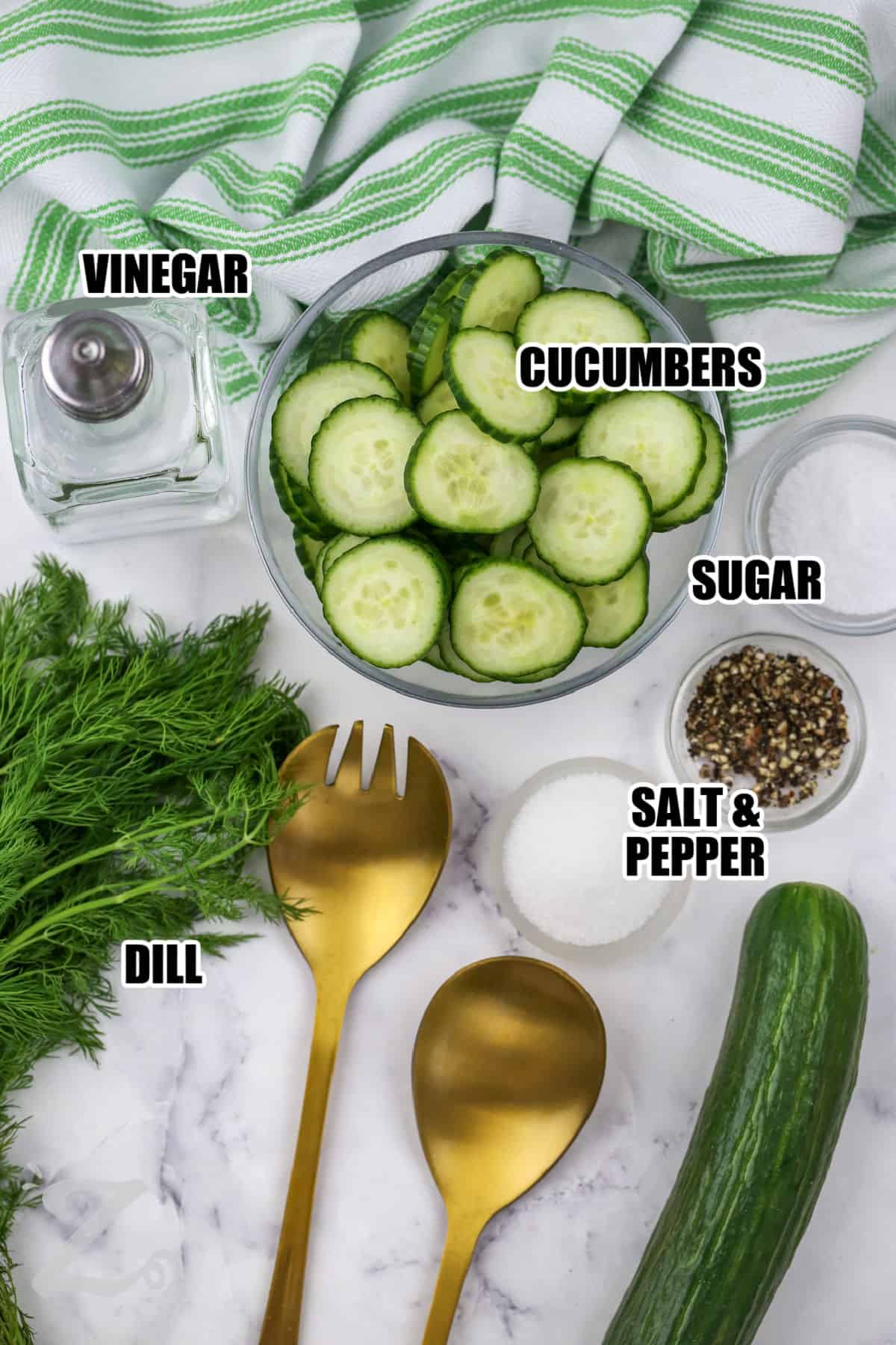 Looking for an easy cucumber salad that is fresh, crisp, and full of flavor? This recipe combines English cucumbers with a bright dill dressing for a side dish everyone will enjoy. It pairs beautifully with grilled chicken, burgers, seafood, or your favorite sandwiches at lunch or dinner. Add it to your menu today. #ourzestylife vinegar , cucumbers , sugar , dill , salt and pepper with labels to make Easy Cucumber Salad