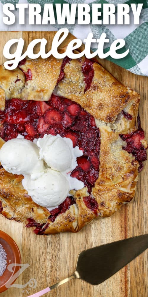 Strawberry Galette with vanilla ice cream scoops on top and a title