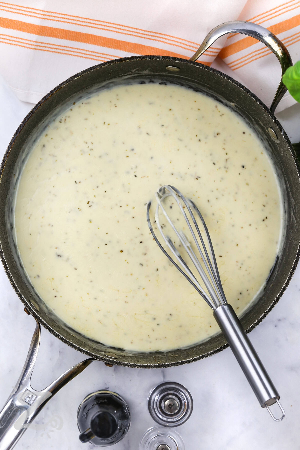 whisking sauce for Slow Cooker Marry Me Chicken