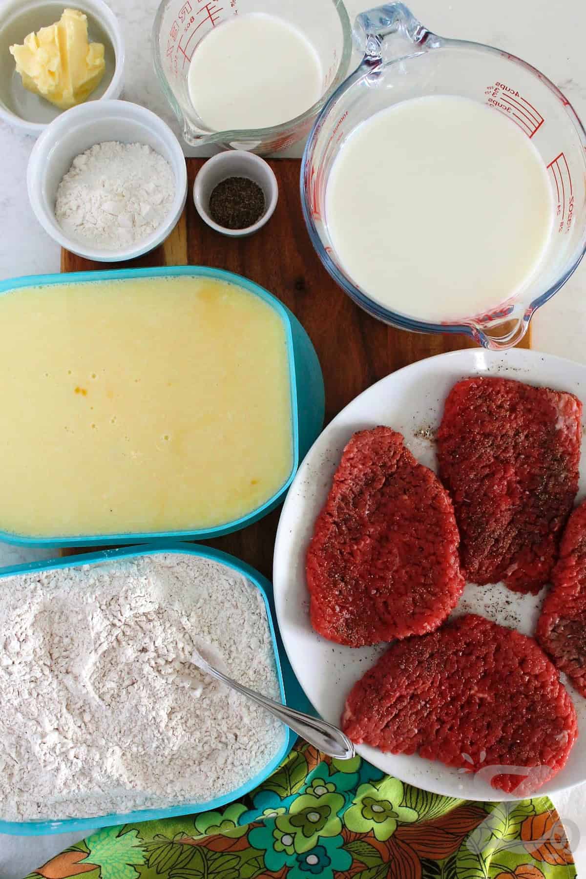 process to make chicken fried steak with country gravy where the seasonings were added to the flour, and the milk and eggs are whisked together