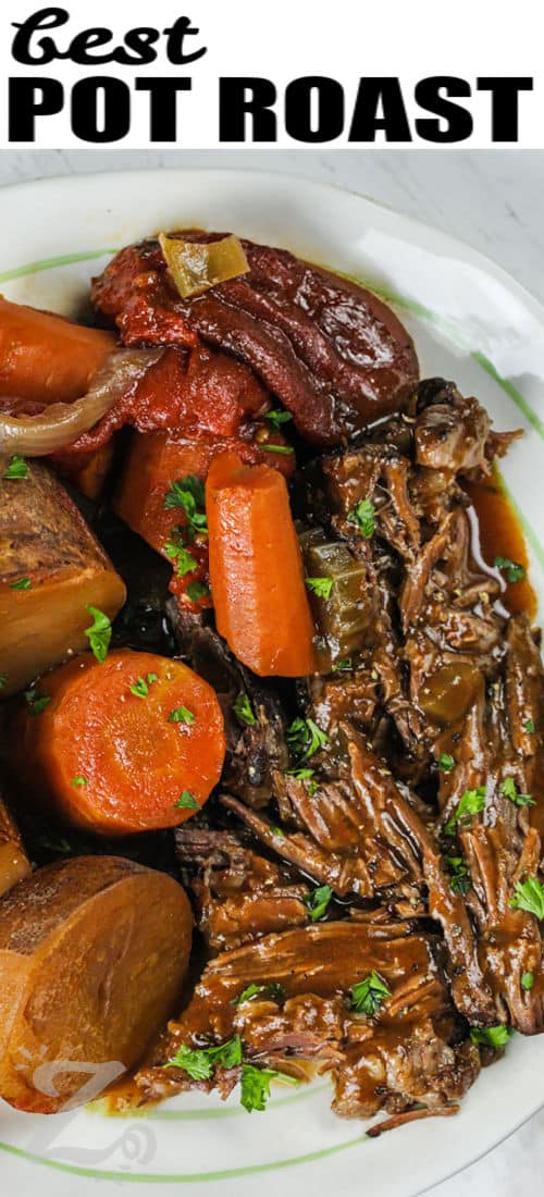 Best Pot Roast on a plate with potatoes carrots and onion with a title