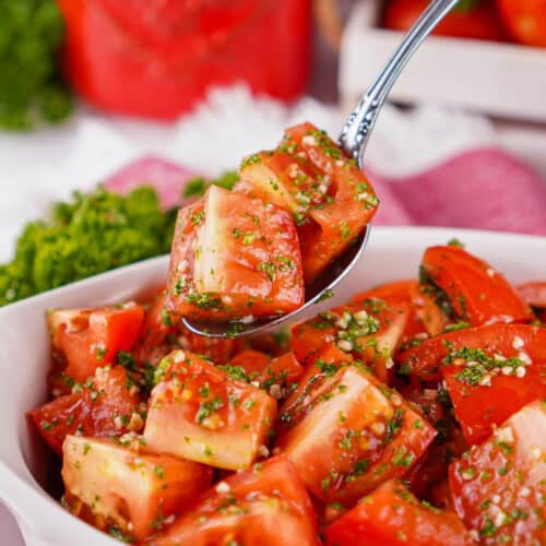 Marinated Tomatoes on a spoon