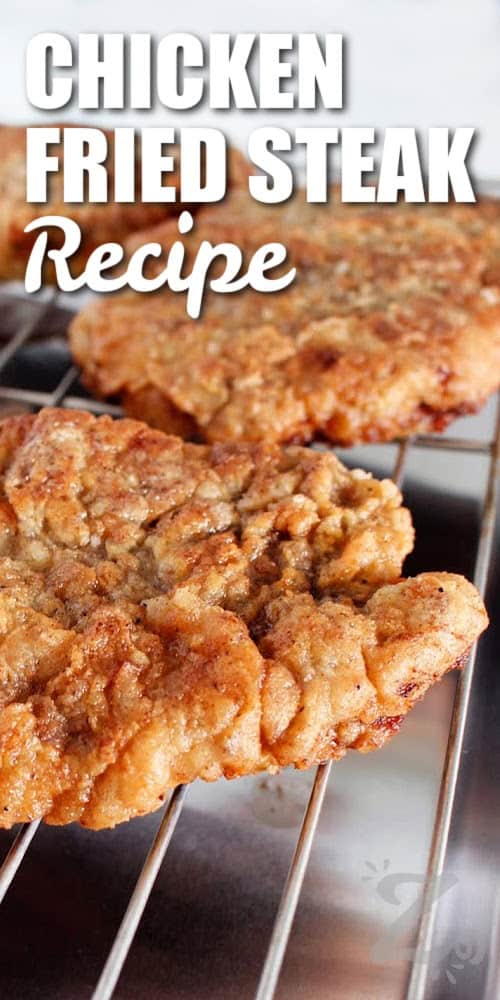 chicken fried steak on a wire rack, with a title