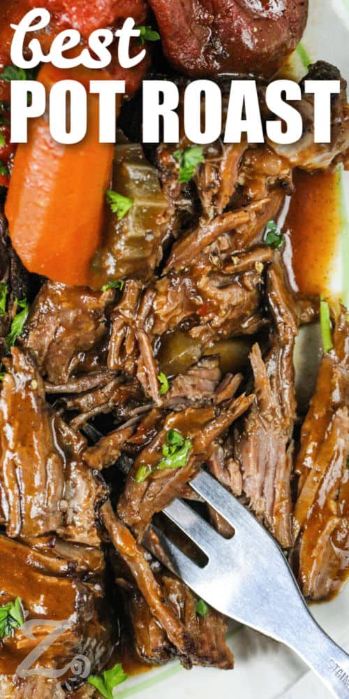 tender Best Pot Roast on a plate with a fork and a title