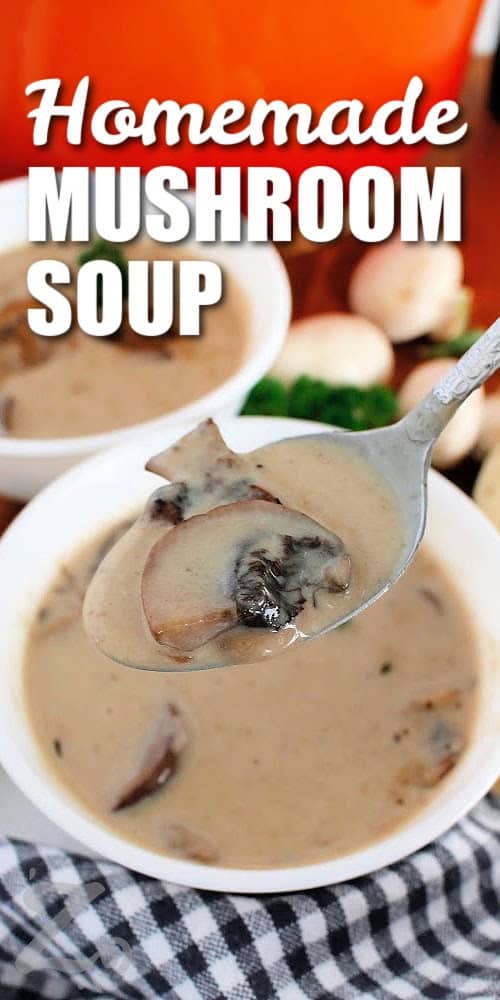 A spoon full of homemade cream of mushroom soup, with two bowls of it in the background, with a title.